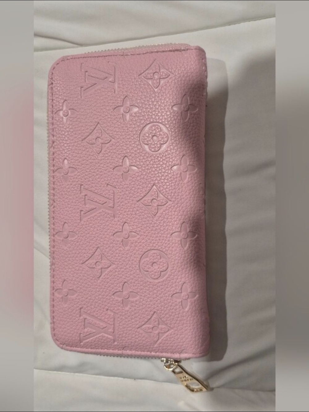 Pink Embossed Monogram Zip-Around Wallet